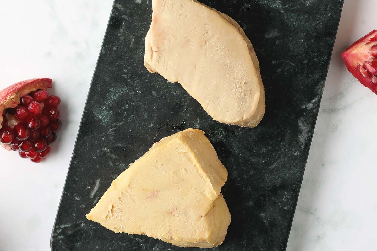 D'Artagnan foie gras slices on a dark board