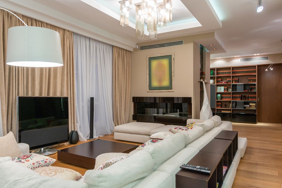 Explore this opulent living room featuring elegant decor and modern design elements.